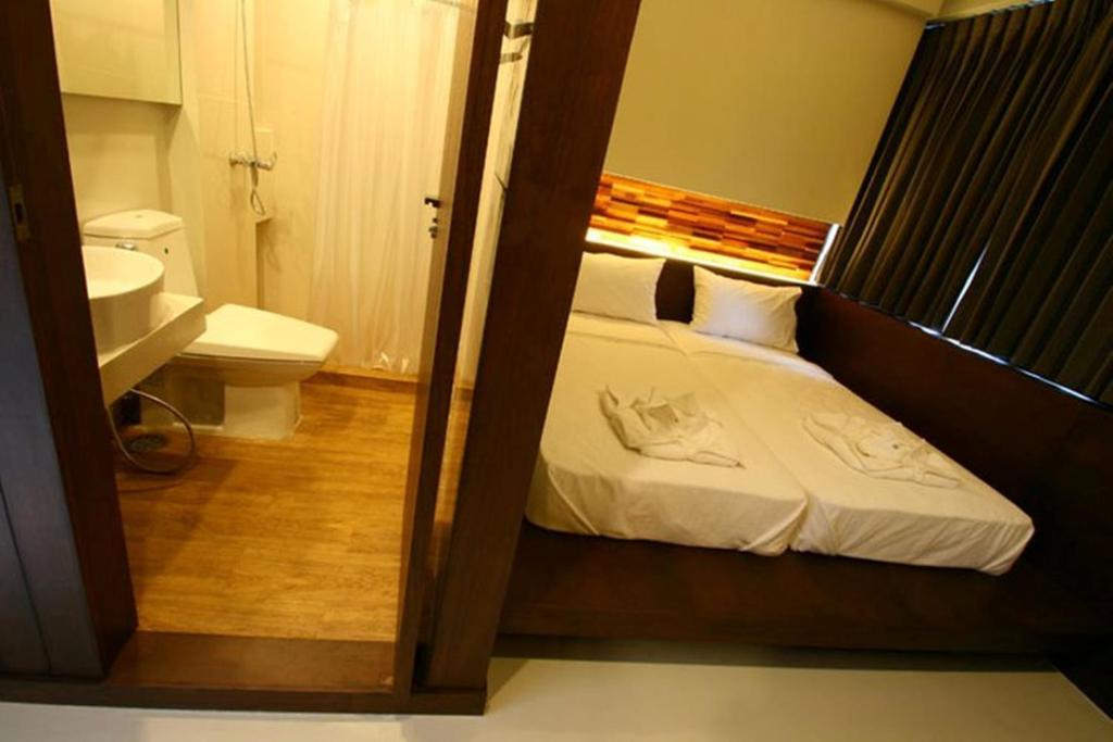 At One Inn Hualampong Bangkok Rom bilde